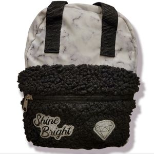 Stella and Max Fashion Mini Backpack.